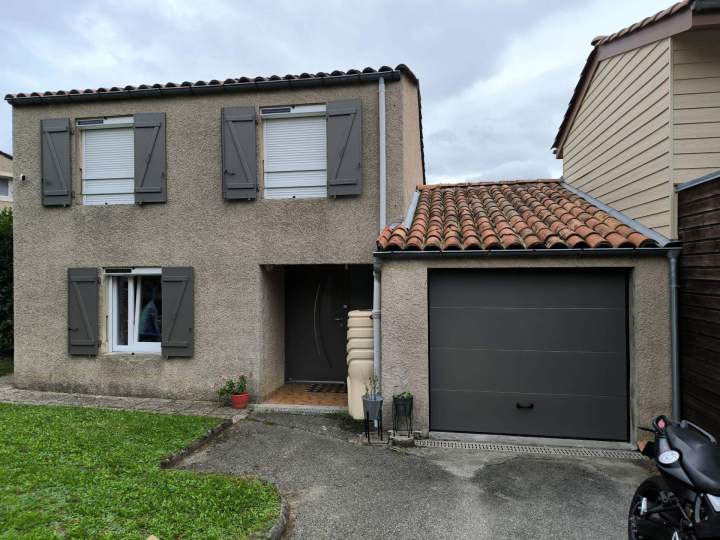 Remplacement volets, porte et portes de garage Après